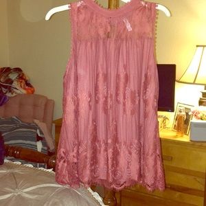 A pink lace float top.